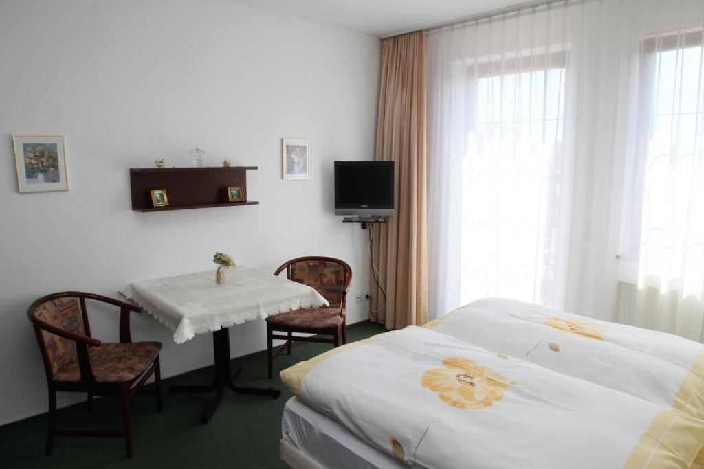 Pension Am Markt Люббен Номер фото